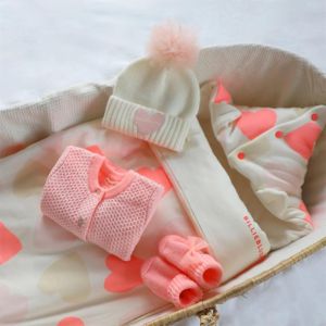 Bonnet tricot à pompon résille Beige