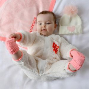 Bonnet tricot à pompon résille Beige